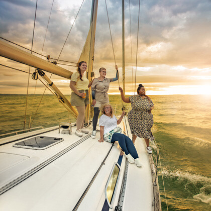 Lymphology Four women with lymphatic conditions are on a boat at sea.